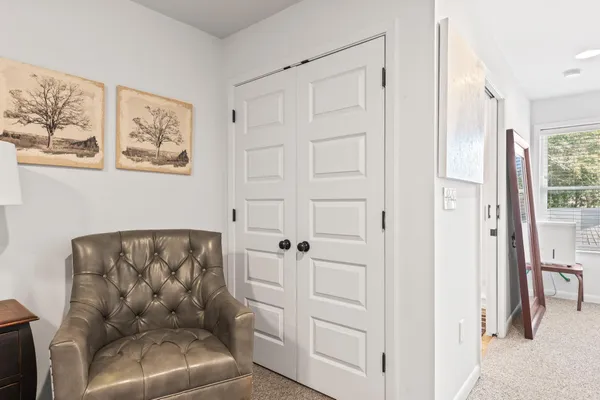 a living room with furniture and a couch
