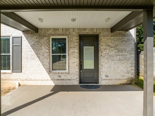 a front view of a house with a garage