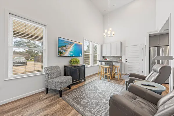 a living room with furniture and a window