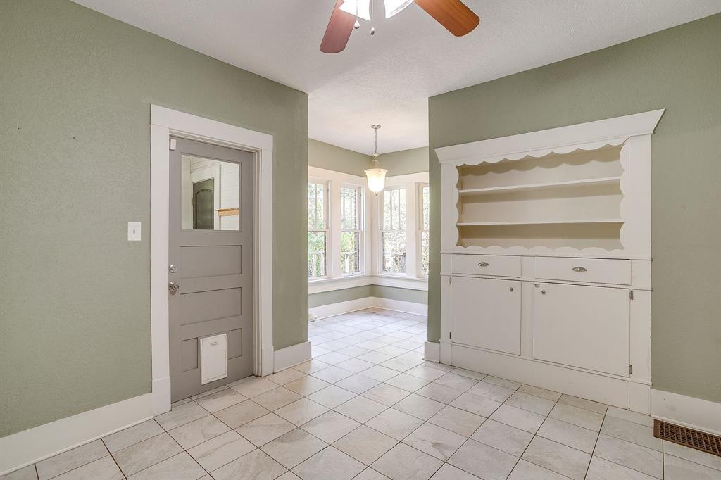 2312 Mistletoe Avenue Fort Worth, TX 76110 - Photo 36 of 40 a view of a hallway to closet and utility room