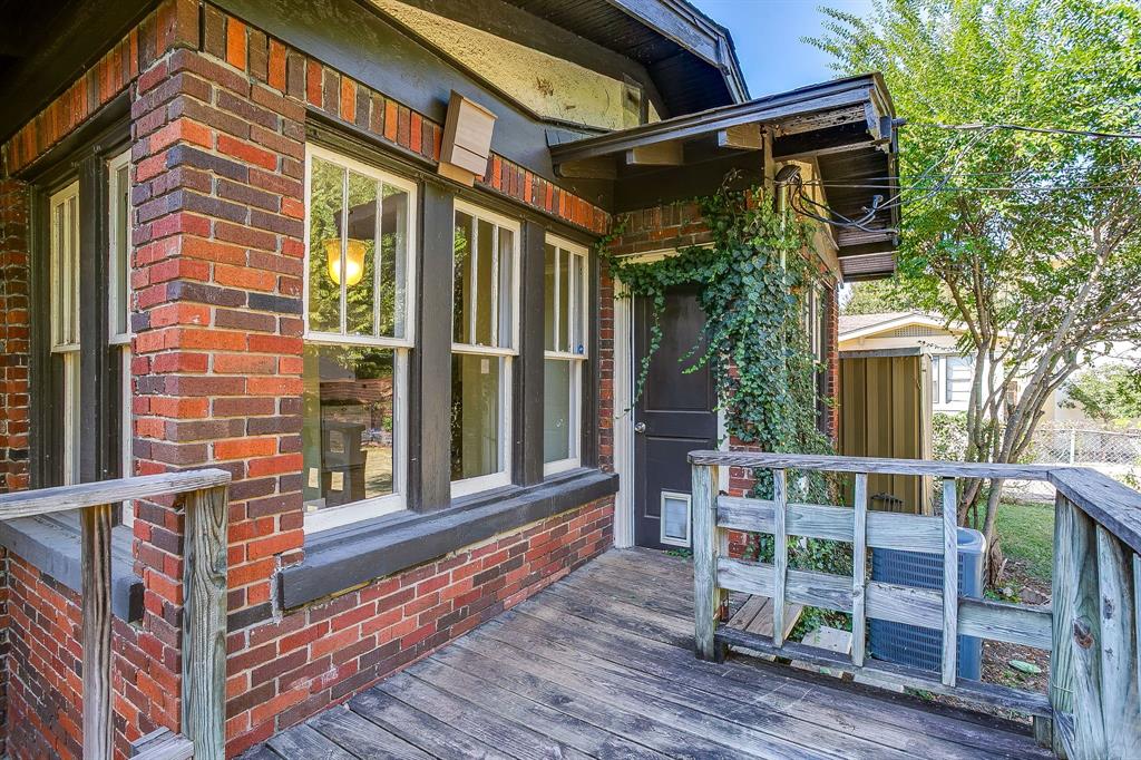 2312 Mistletoe Avenue Fort Worth, TX 76110 - Photo 39 of 40 a front view of a house with a porch