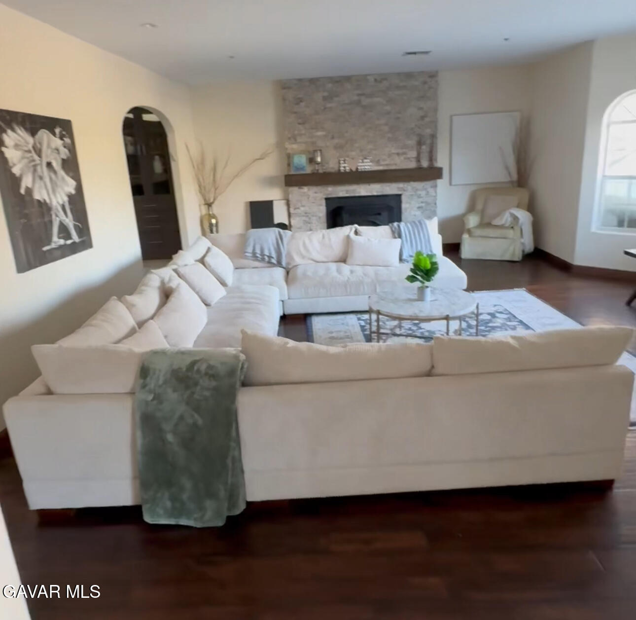 13136 Elizabeth Lake Road Leona Valley, CA 93551 - Photo 2 of 4 a living room with furniture and a fireplace