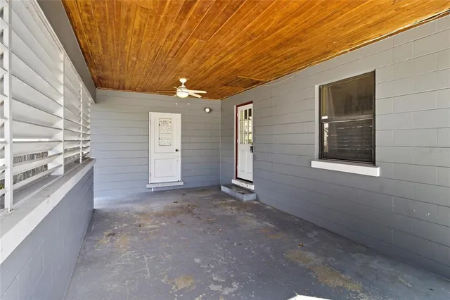 a view of a hallway with an empty room