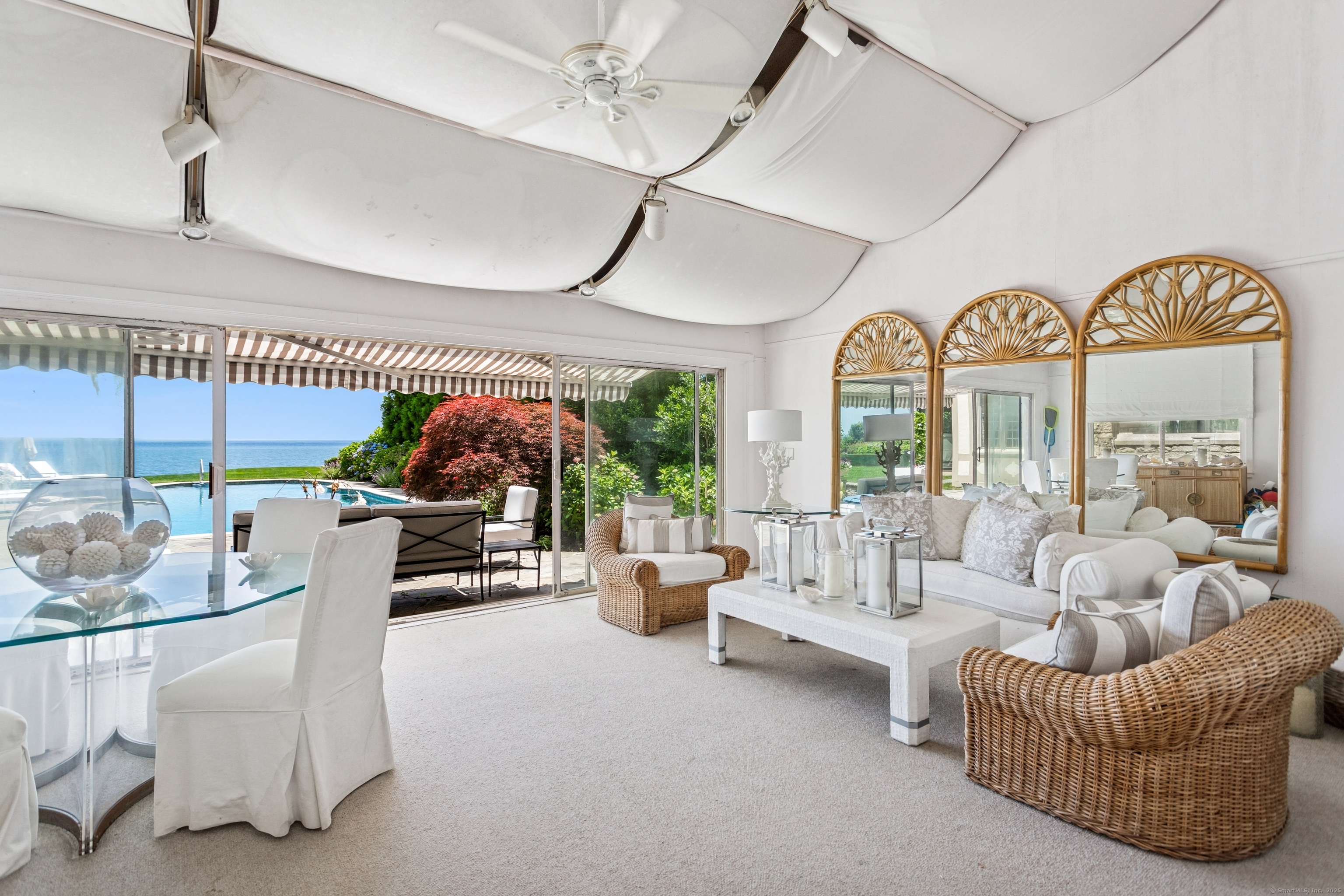 92 Beachside Avenue Westport, CT 06880 - Photo 23 of 28 a living room with furniture and a large window
