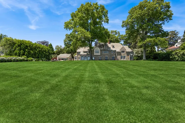 a view of a house with a big yard