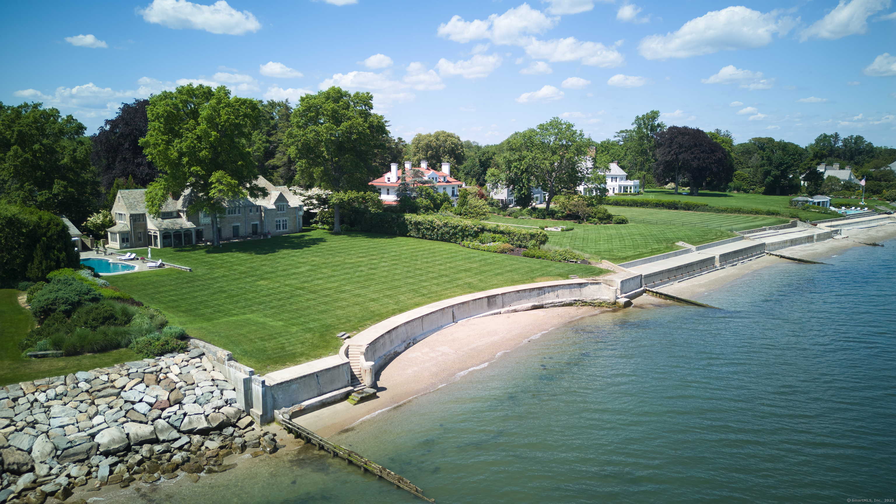 92 Beachside Avenue Westport, CT 06880 - Photo 27 of 28 a view of a golf course with a garden