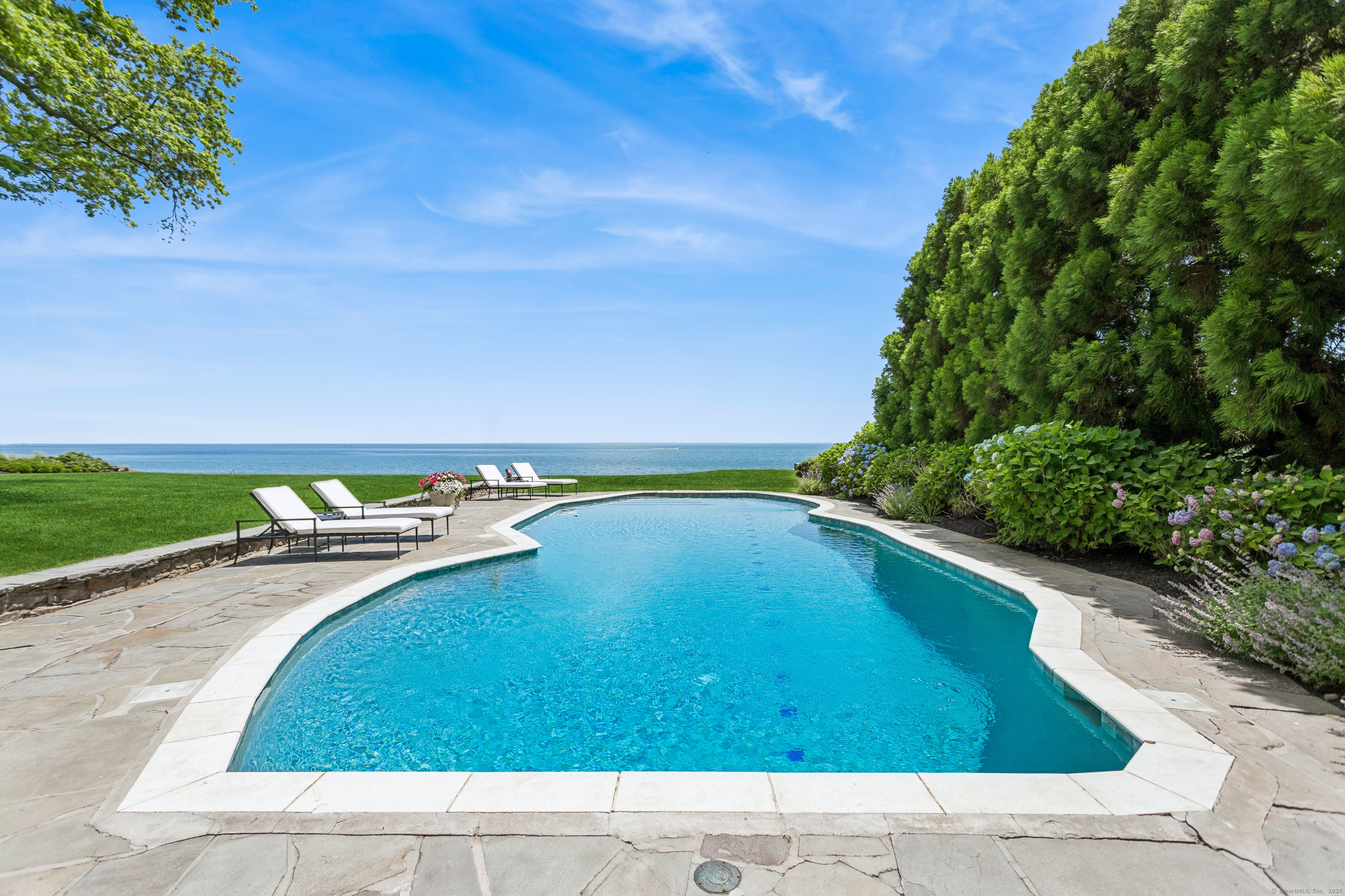 92 Beachside Avenue Westport, CT 06880 - Photo 8 of 28 a view of swimming pool with a yard