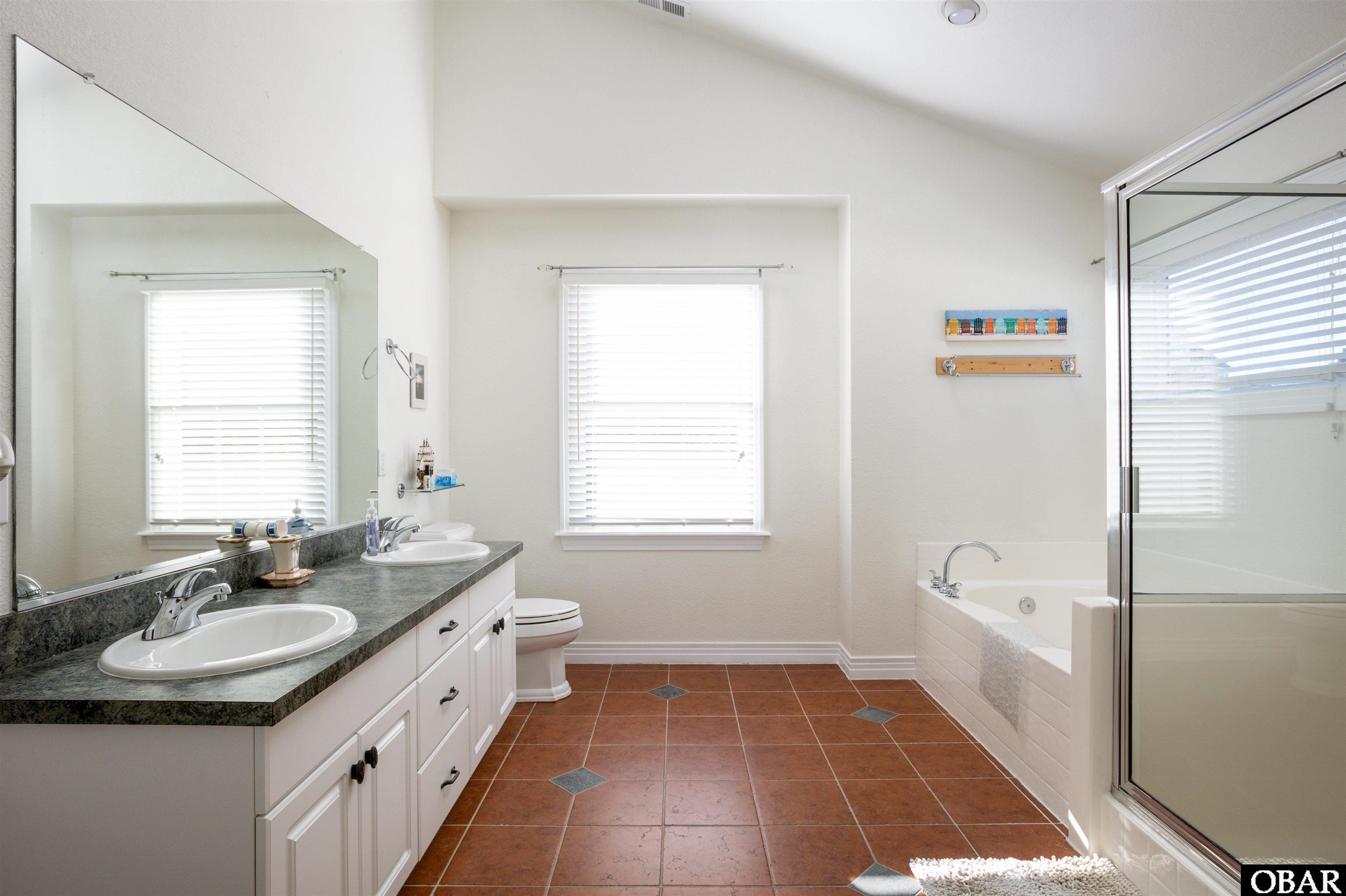 709 Currituck Cay Corolla, NC 27927 - Photo 16 of 33 Owners Bathroom