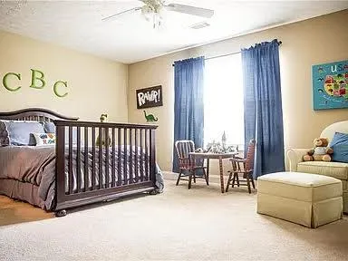 a bed room with a bed and a couch