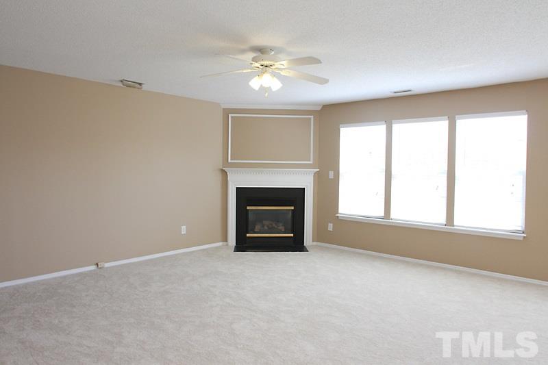 Gas log fireplace, fresh paint and new carpet throughout