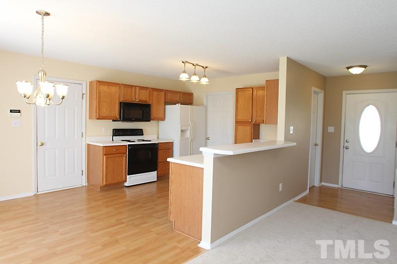 Refrigerator remains.  Laundry room located off kitchen