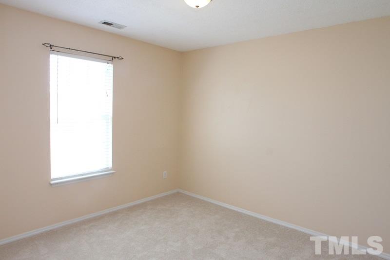 4412 Jordan Oaks Way Raleigh, NC 27604 - Photo 10 of 11 Master bedroom and two additional bedrooms