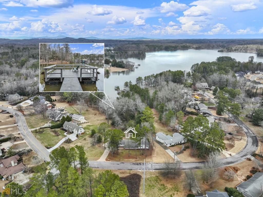 172 Thompson Place Gainesville, GA 30506 - Photo 17 of 32 a view of a lake in middle of the town