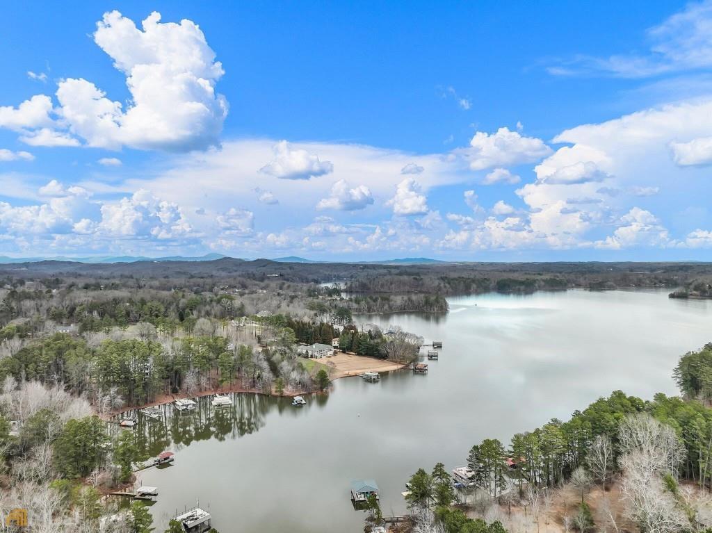 172 Thompson Place Gainesville, GA 30506 - Photo 26 of 32 a view of a lake in middle of a house