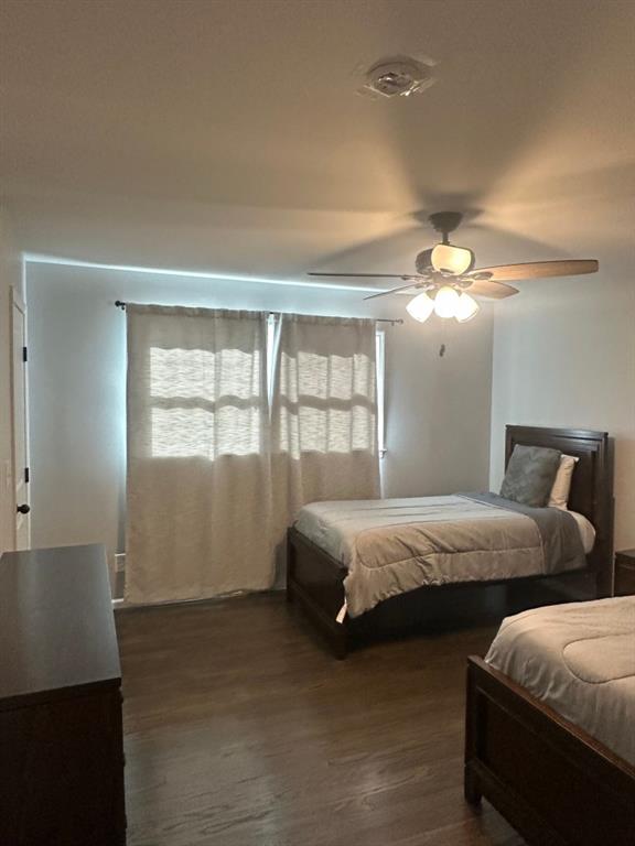 172 Thompson Place Gainesville, GA 30506 - Photo 9 of 15 a bedroom with two beds and a chandelier