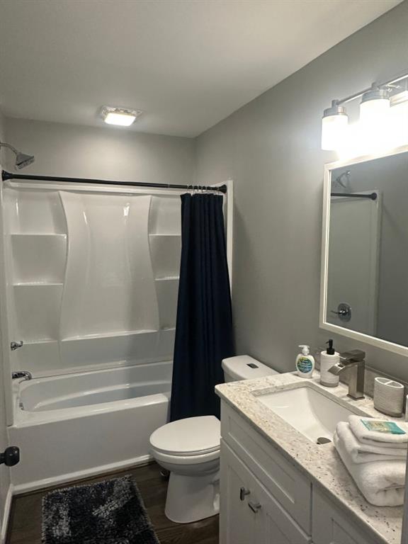 172 Thompson Place Gainesville, GA 30506 - Photo 10 of 15 a bathroom with a granite countertop sink toilet and shower
