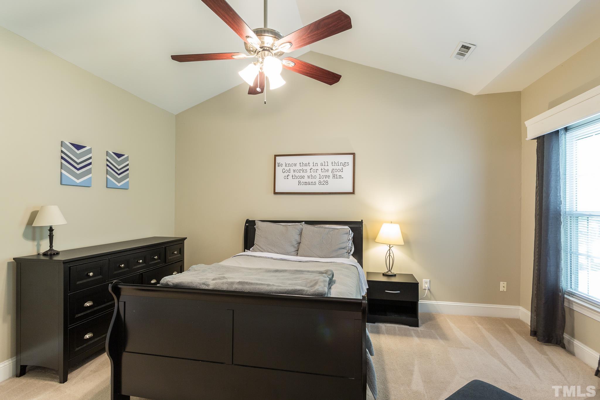 5225 Covington Bend Drive Raleigh, NC 27613 - Photo 20 of 30 a bedroom with a bed and a window