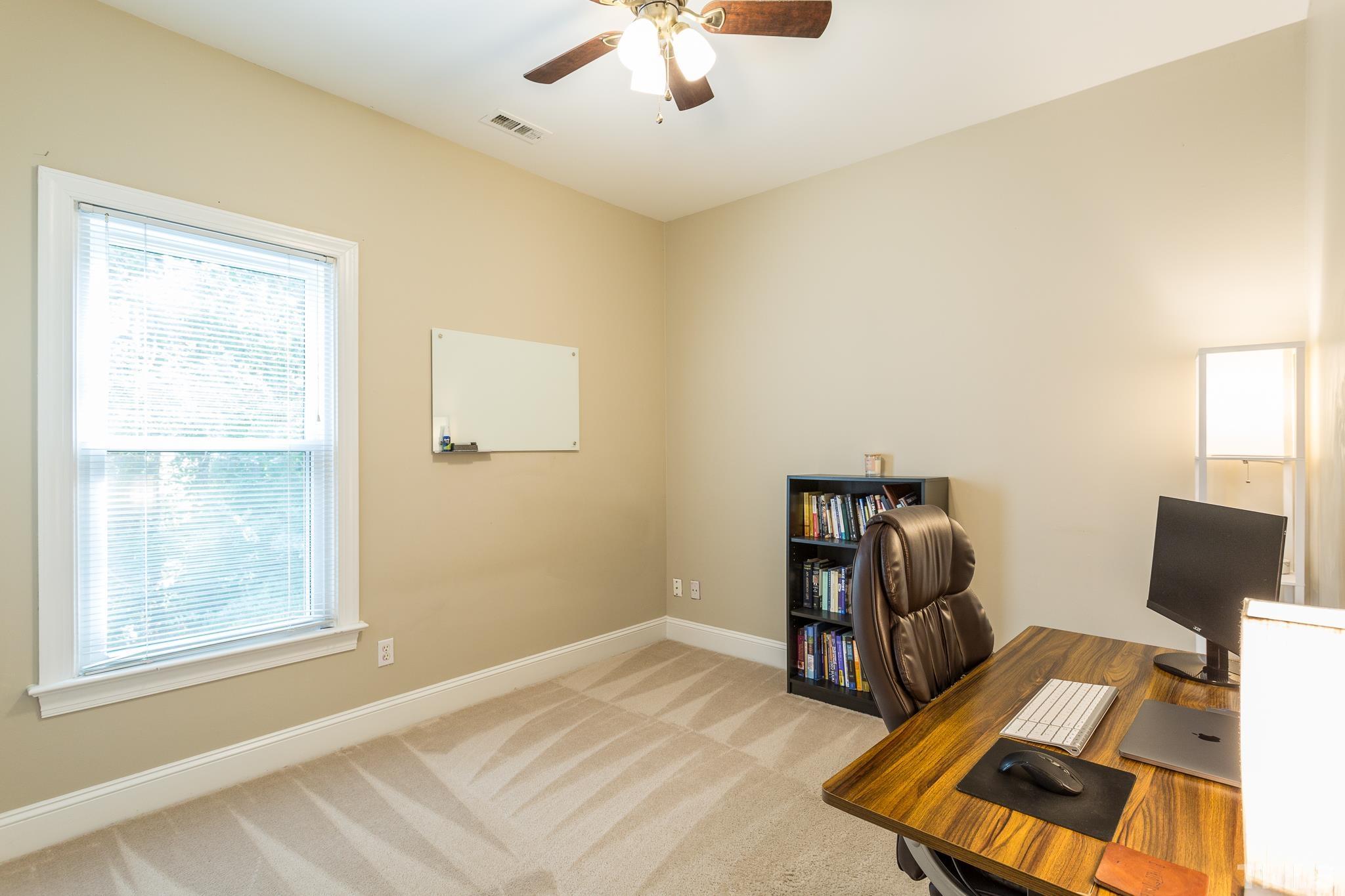 5225 Covington Bend Drive Raleigh, NC 27613 - Photo 23 of 30 a bedroom with bed and a window