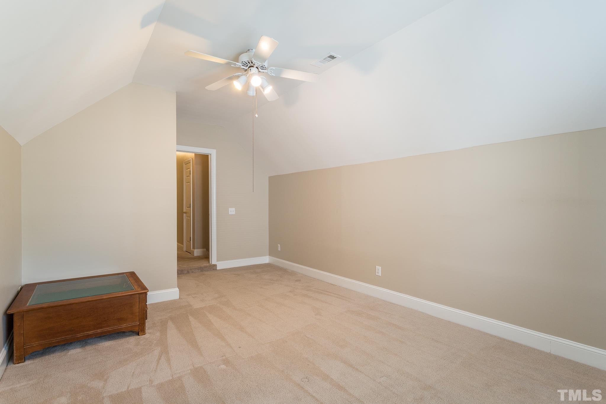 5225 Covington Bend Drive Raleigh, NC 27613 - Photo 27 of 30 an empty room with a fan