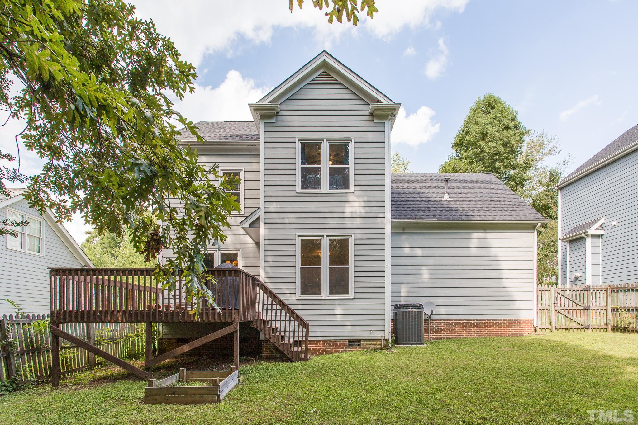 5225 Covington Bend Drive Raleigh, NC 27613 - Photo 29 of 30 a front view of a house with a yard