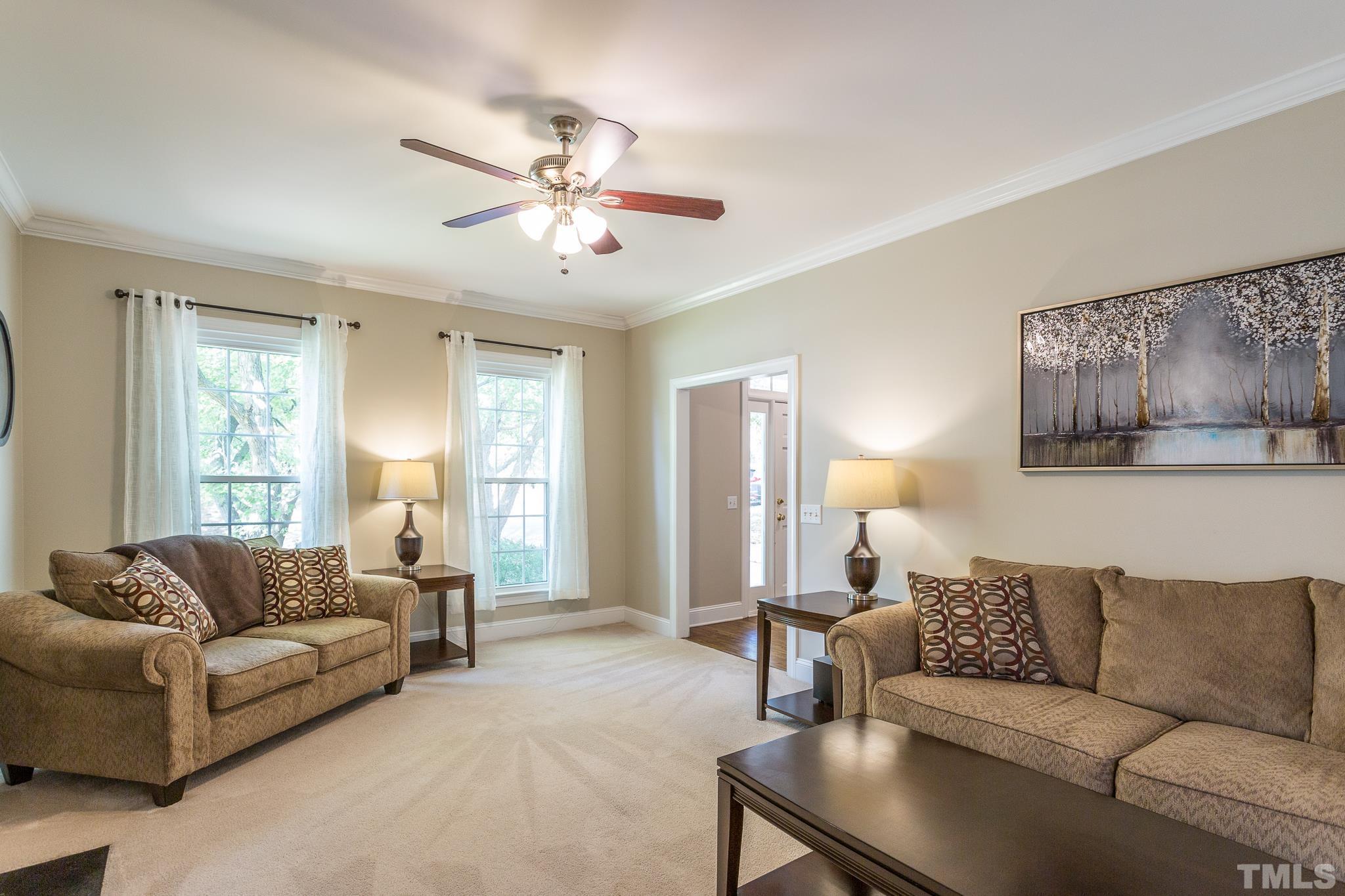 5225 Covington Bend Drive Raleigh, NC 27613 - Photo 6 of 30 a living room with furniture and a large window