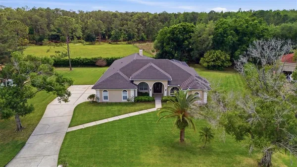 $1,199,950 | 18629 Avenue Capri, Lutz, FL 33558