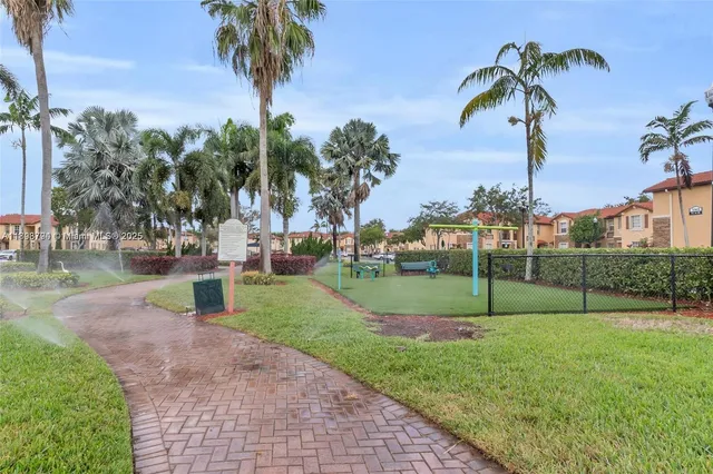 a view of a park with a apartment