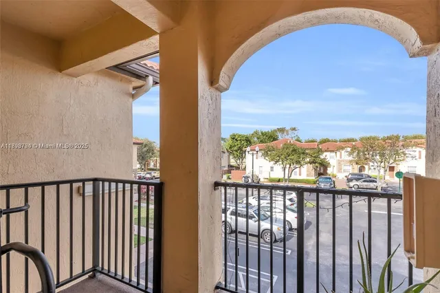 a view of a balcony with an outdoor space