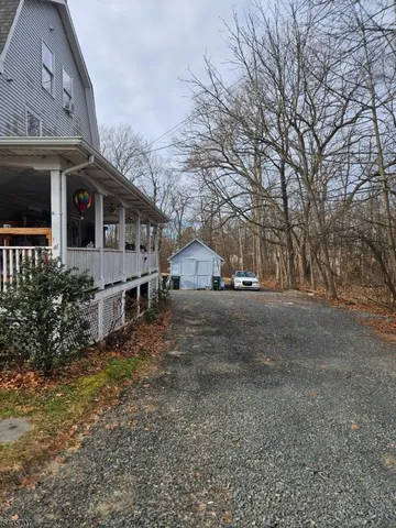 a view of a house with a street