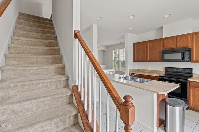 a view of a livingroom with a staircase