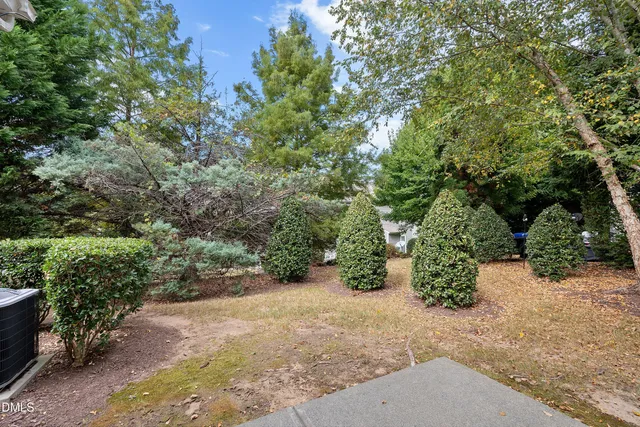 a view of a house with a small garden