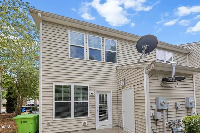front view of a house and a yard