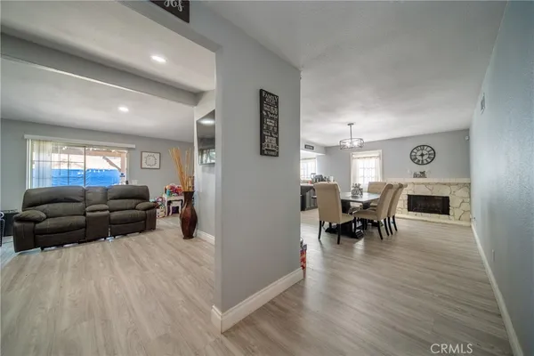 a living room with furniture and a table