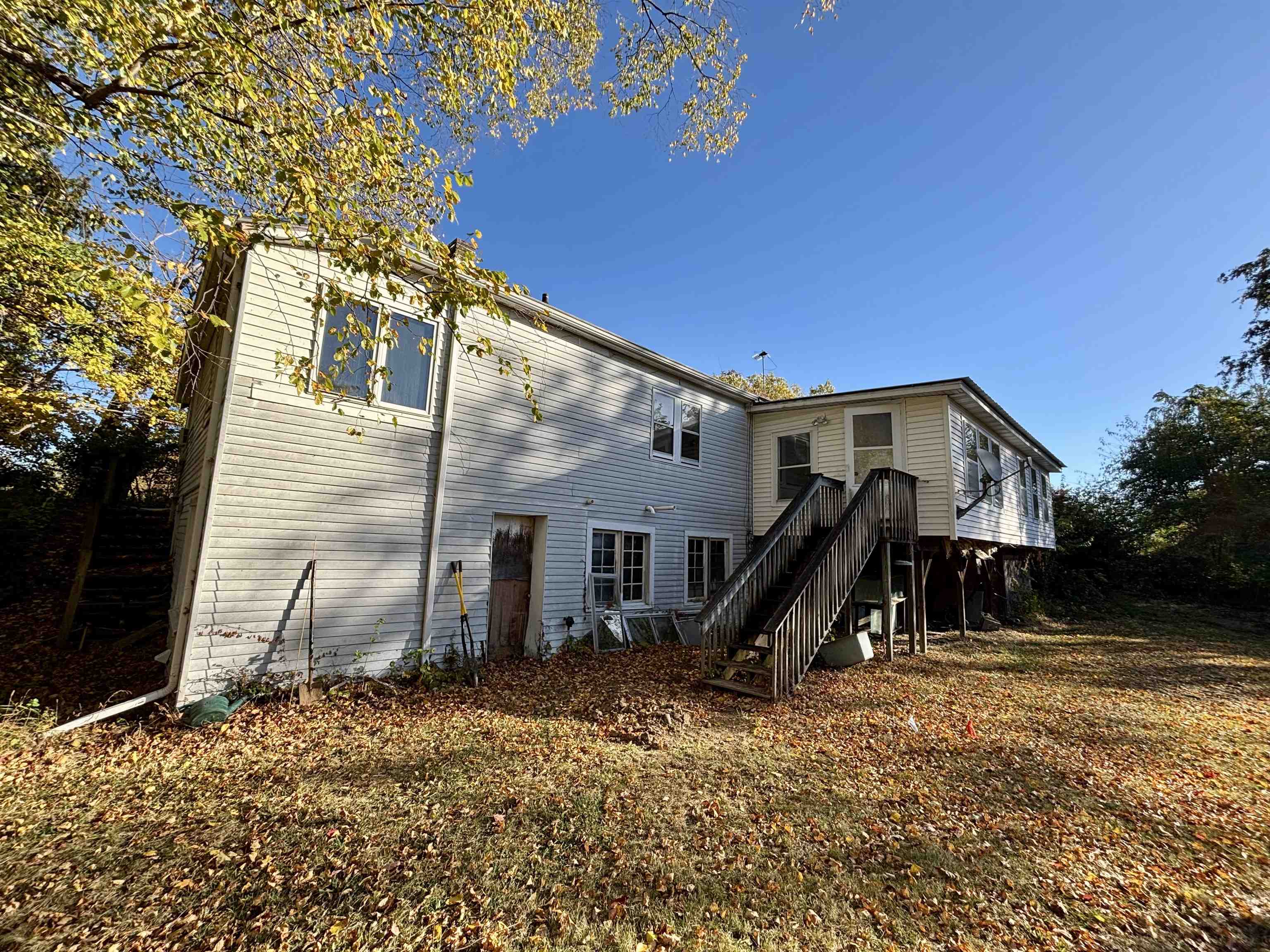 7151 West Blackjack Road Galena, IL 61036 - Photo 17 of 49 a view of a house with backyard