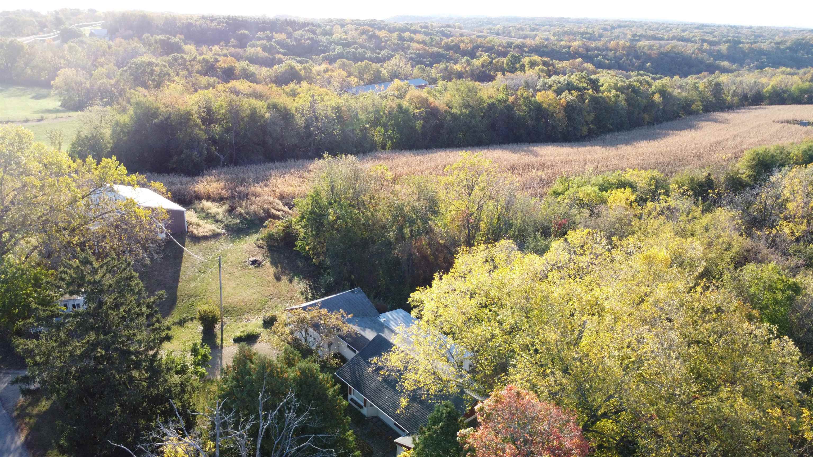 7151 West Blackjack Road Galena, IL 61036 - Photo 2 of 49 a view of a lake with lots of trees