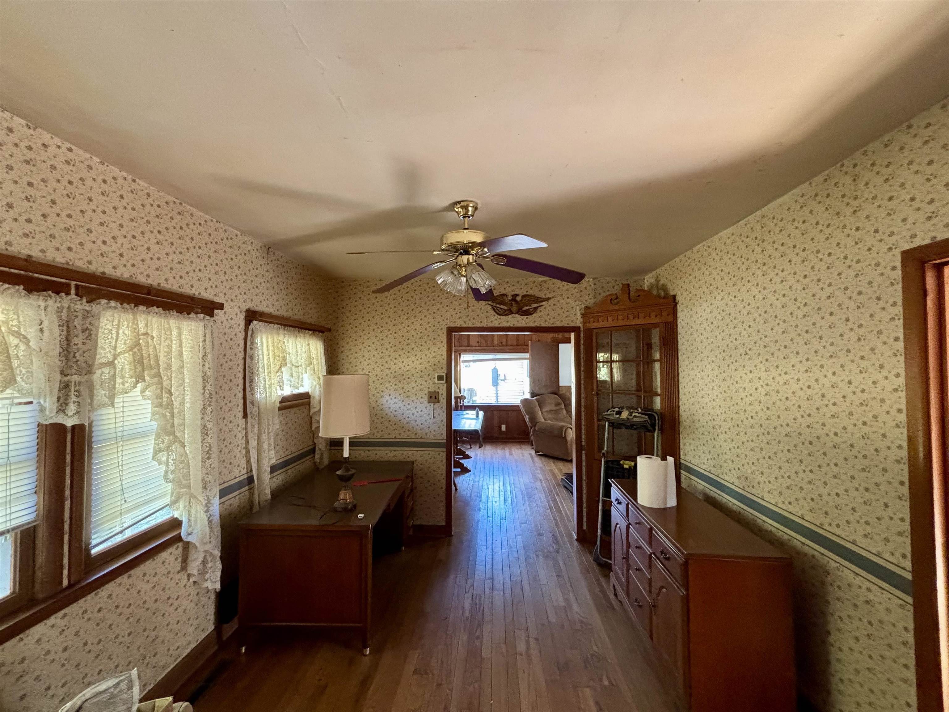 7151 West Blackjack Road Galena, IL 61036 - Photo 23 of 49 a living room with furniture and wooden floor