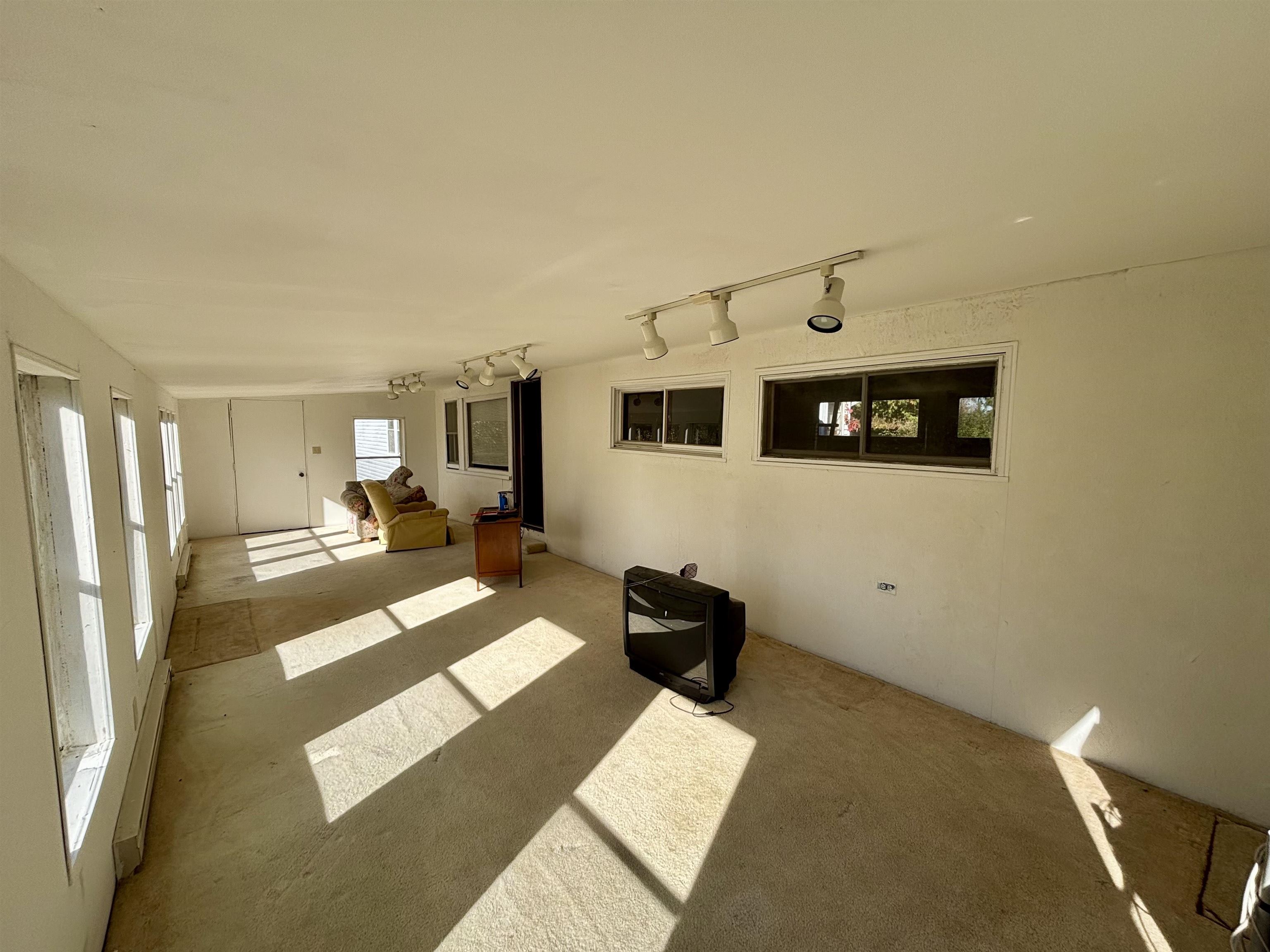 7151 West Blackjack Road Galena, IL 61036 - Photo 29 of 49 a view of a livingroom with furniture and a window