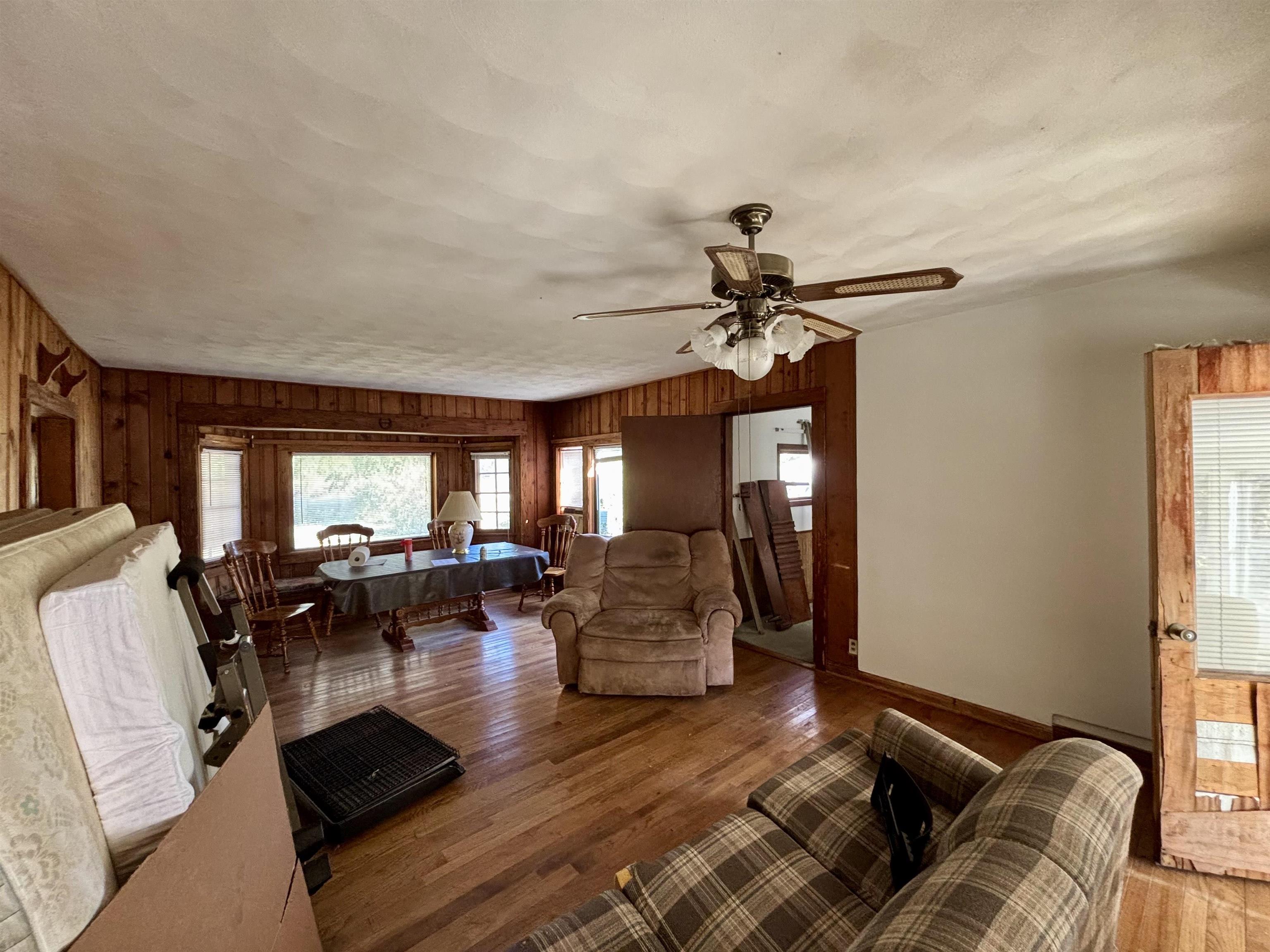 7151 West Blackjack Road Galena, IL 61036 - Photo 38 of 49 a living room with furniture stairs and a window