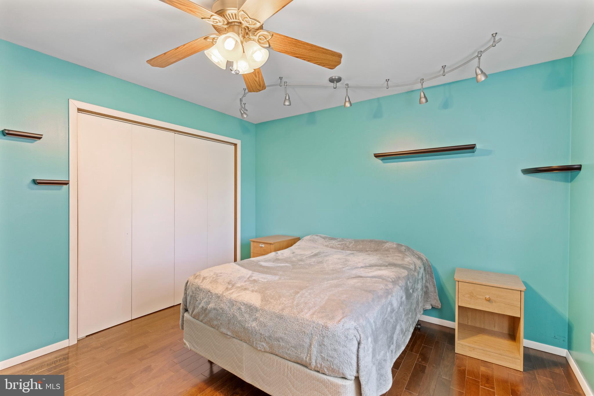 4067 East Texas Road Allentown, PA 18103 - Photo 20 of 37 a bedroom with a bed and a chandelier