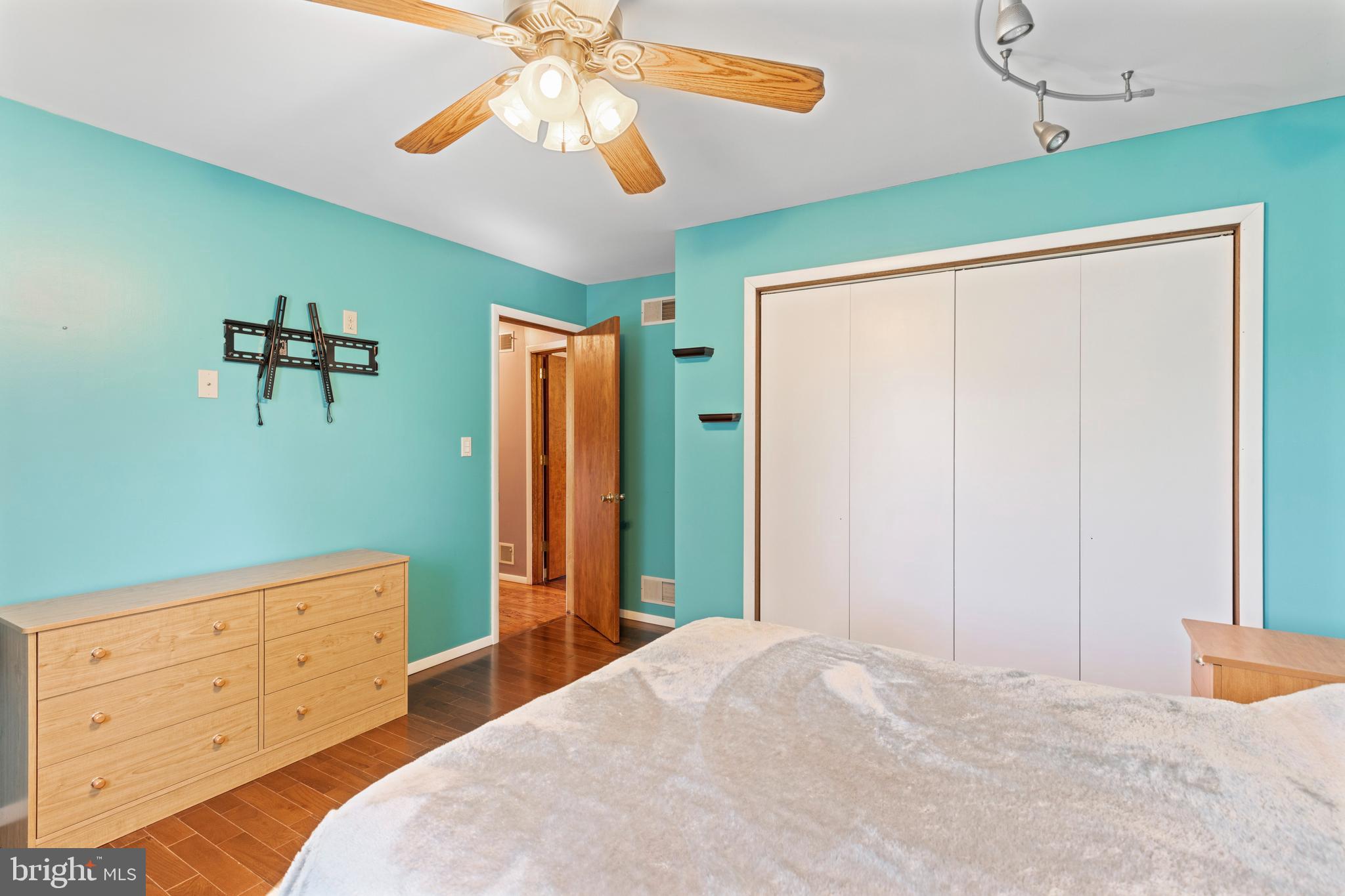 4067 East Texas Road Allentown, PA 18103 - Photo 21 of 37 a bedroom with a bed and a chandelier