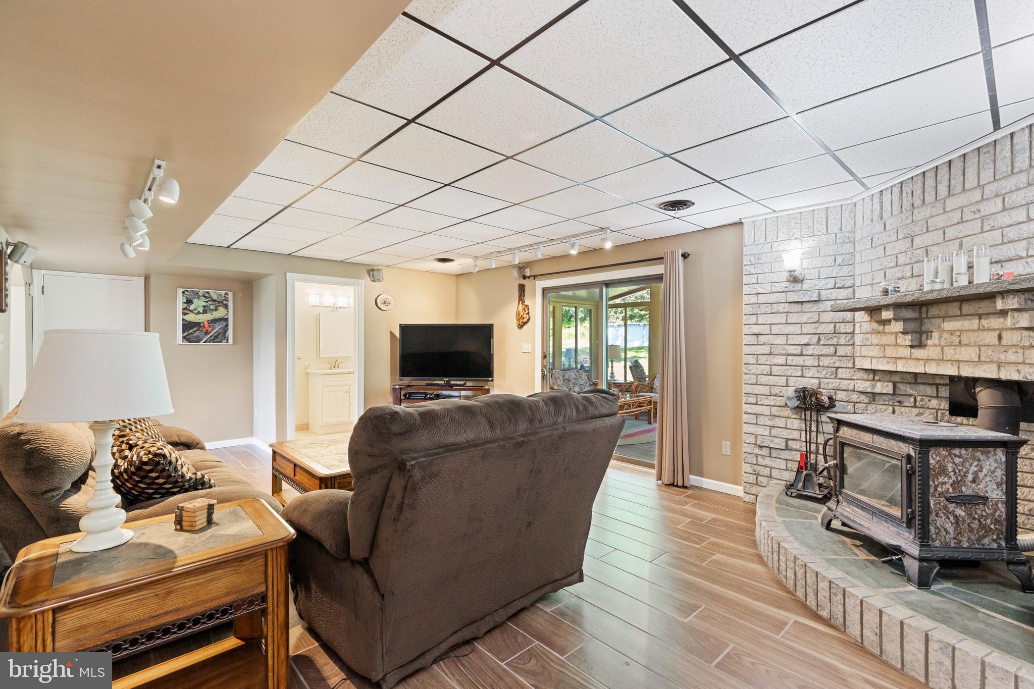 4067 East Texas Road Allentown, PA 18103 - Photo 23 of 37 a living room with furniture wooden floor and a flat screen tv
