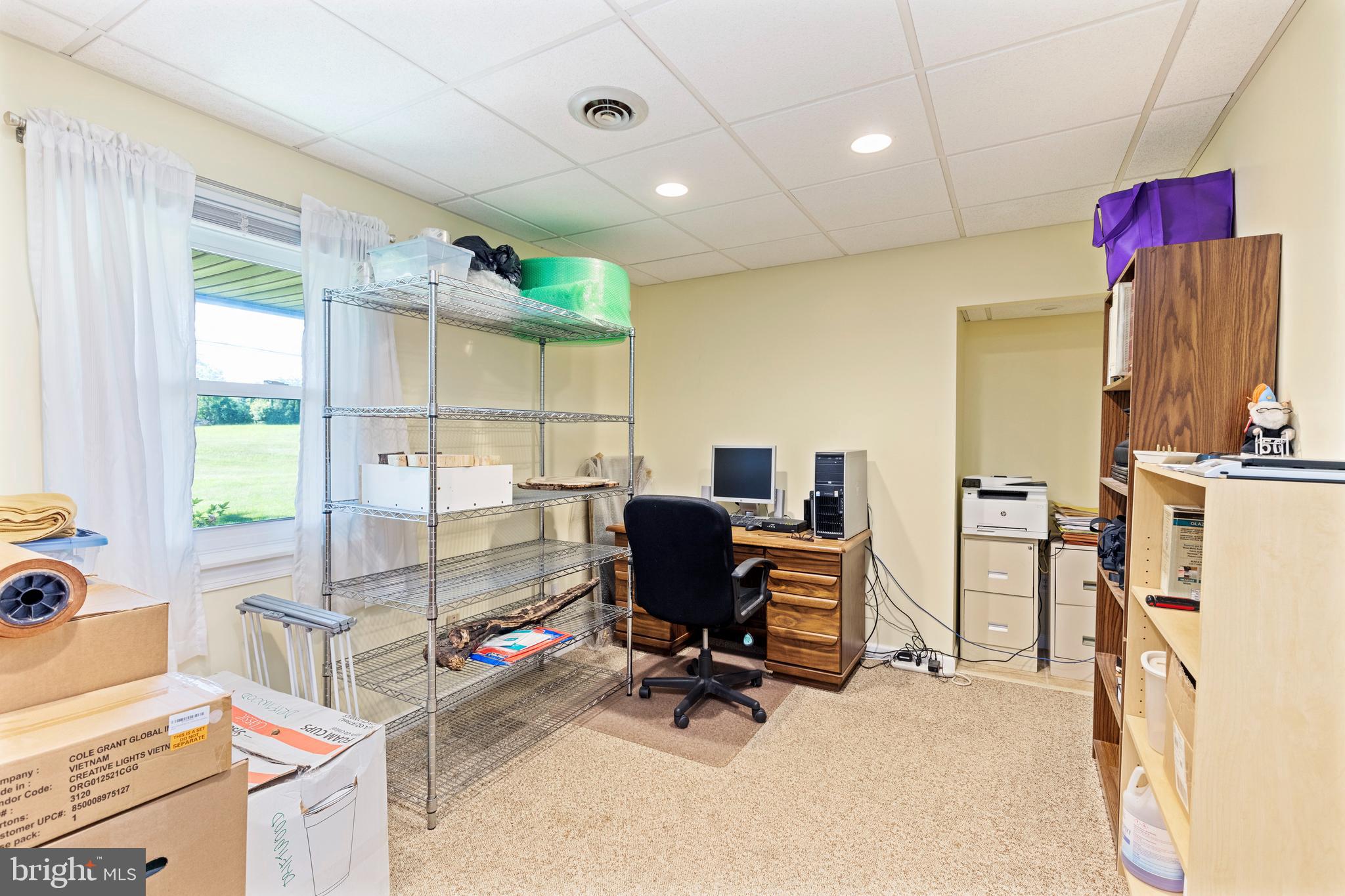 4067 East Texas Road Allentown, PA 18103 - Photo 27 of 37 a view of a workspace with furniture and a window