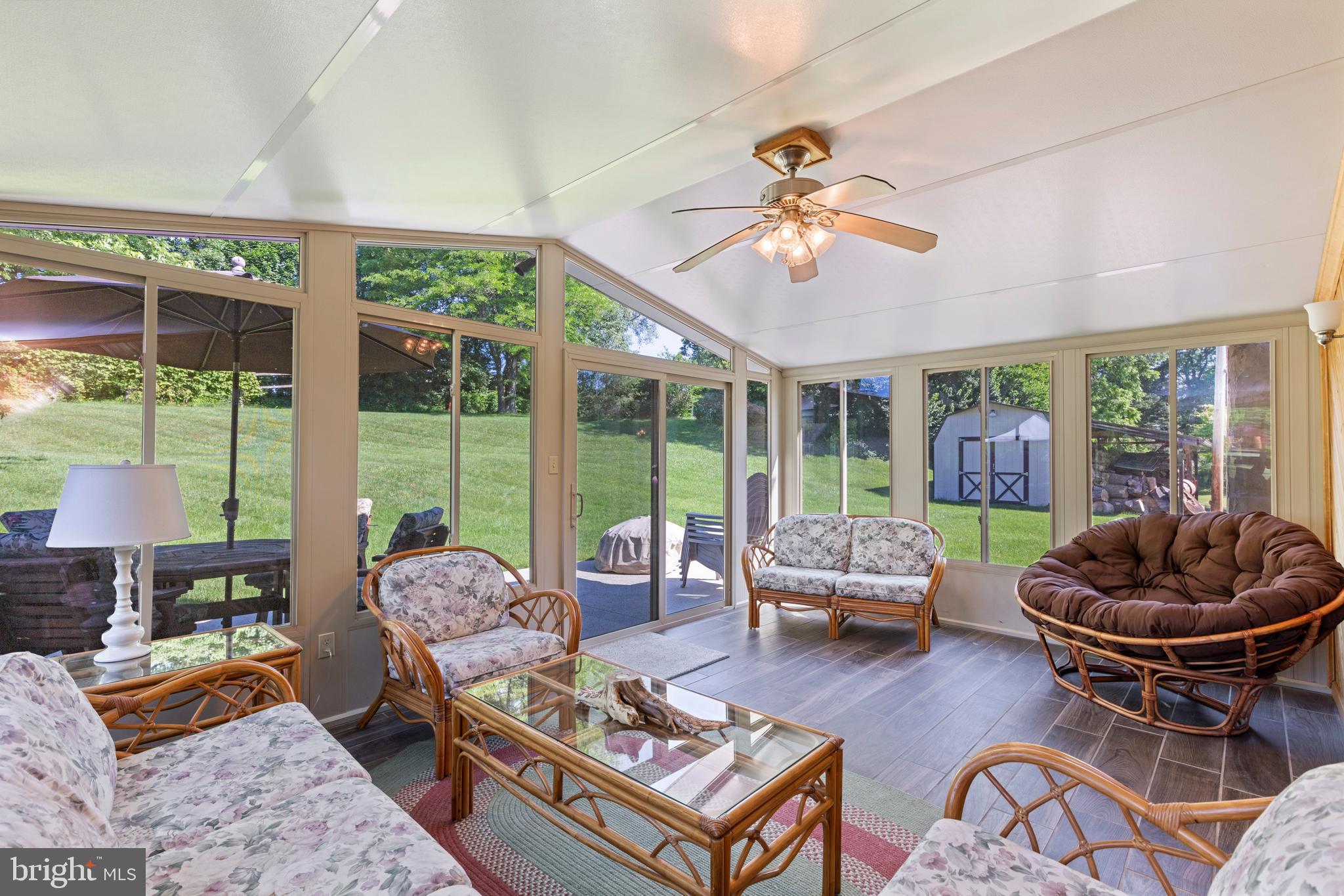 4067 East Texas Road Allentown, PA 18103 - Photo 29 of 37 a living room with furniture and a floor to ceiling window