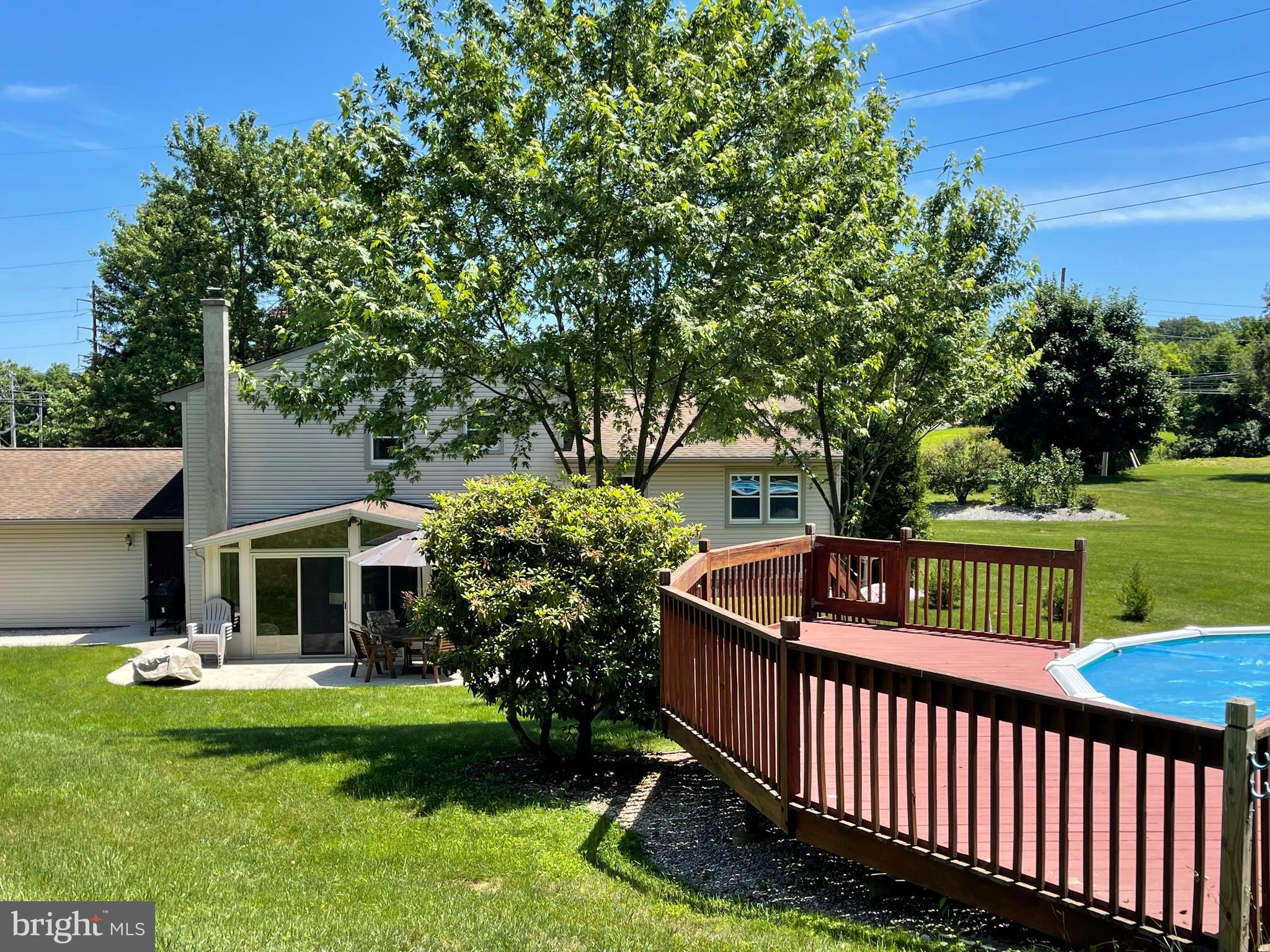 4067 East Texas Road Allentown, PA 18103 - Photo 3 of 37 a front view of a house with garden and deck
