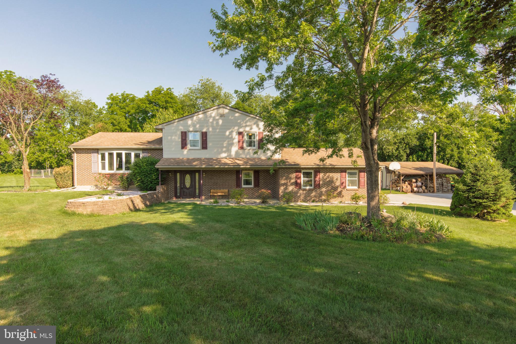 4067 East Texas Road Allentown, PA 18103 - Photo 33 of 37 a front view of a house with a garden