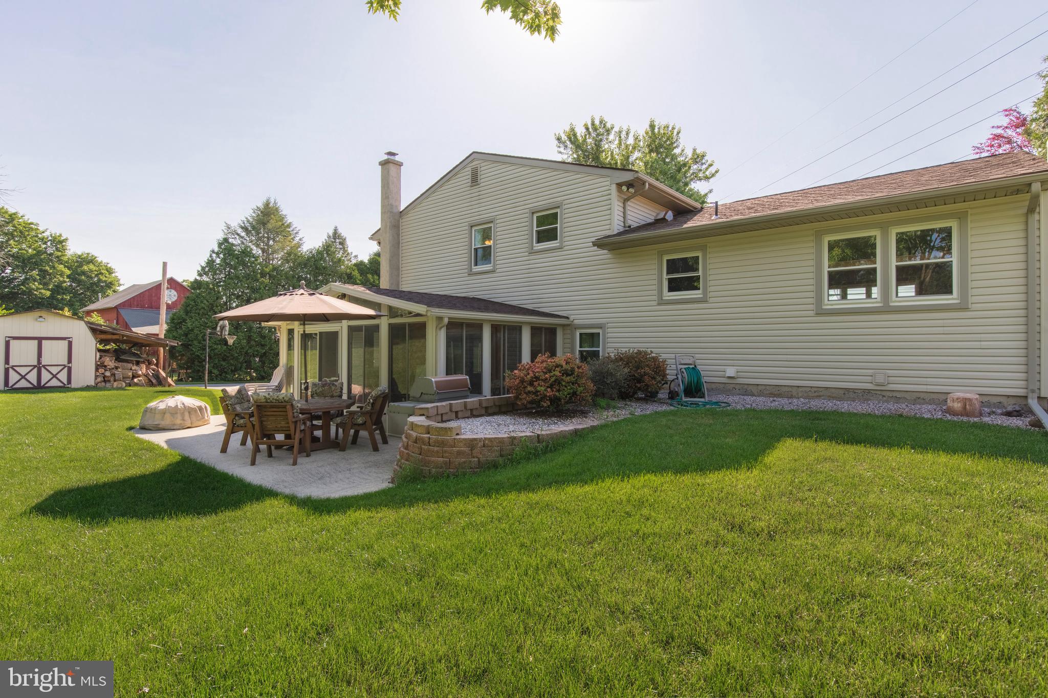 4067 East Texas Road Allentown, PA 18103 - Photo 34 of 37 a front view of house with yard and outdoor seating