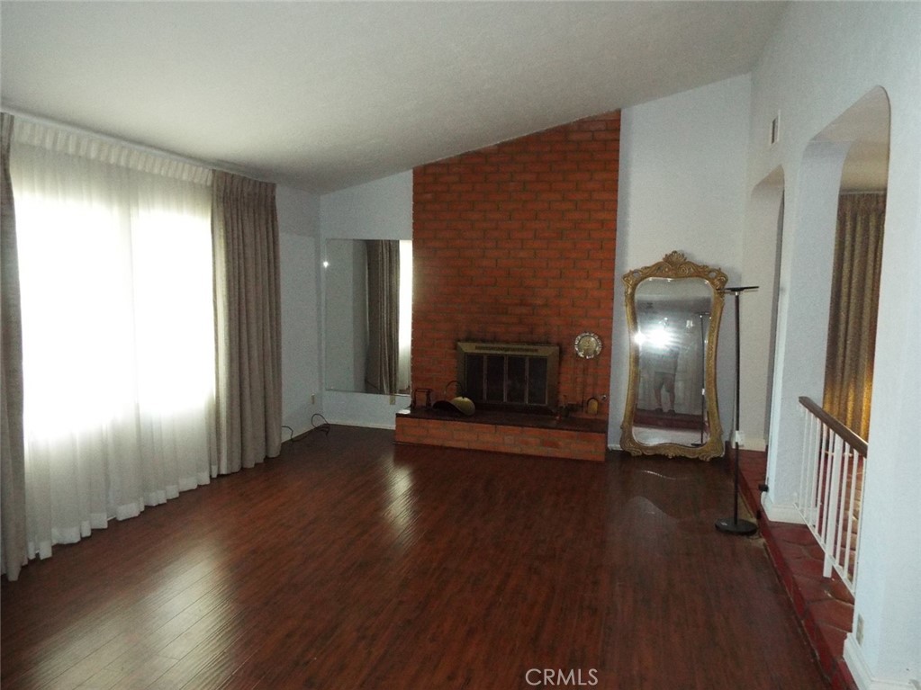 4444 Rochelle Place Encino, CA 91316 - Photo 9 of 19 Fireplace Den