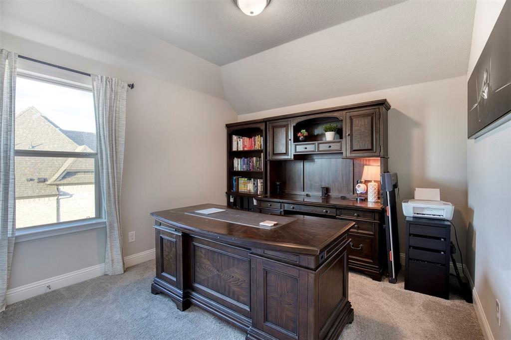 12605 Eagles Bluff Godley, TX 76044 - Photo 24 of 39 a kitchen with a stove and a microwave