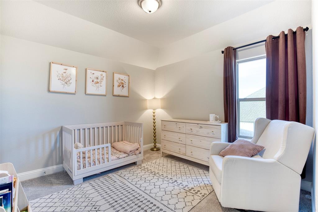 12605 Eagles Bluff Godley, TX 76044 - Photo 25 of 39 a bedroom with furniture and a window