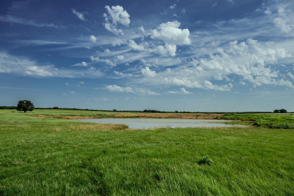 1 West Pleasant Valley Road Bellevue, TX 76228 - Photo 19 of 40 a view of an ocean beach and yard